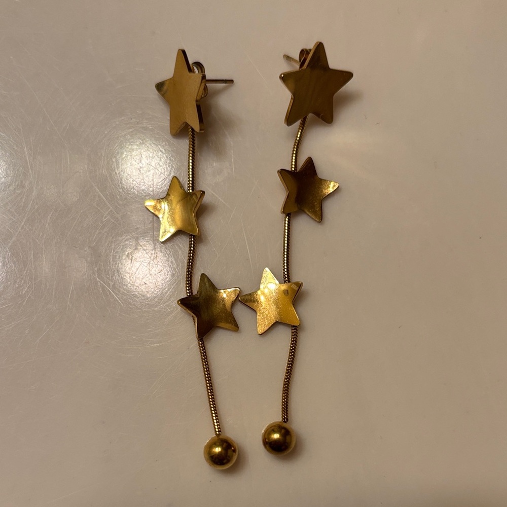 Gold Star Dangle Earrings